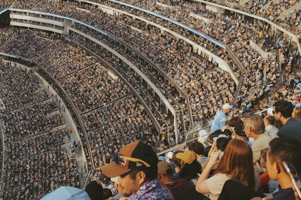 A large crowd filling a sports arena