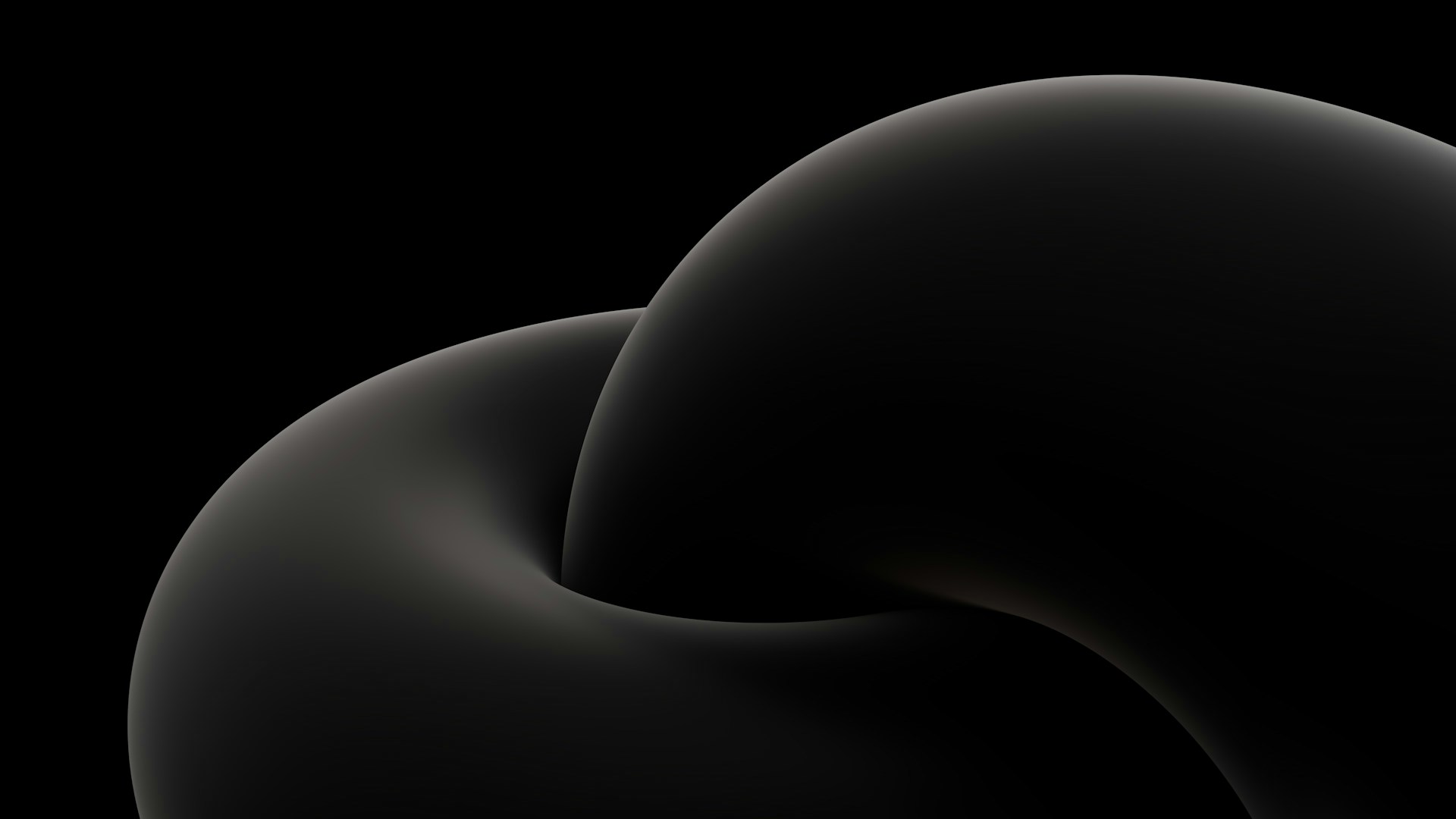 a black background with a curved object in the middle