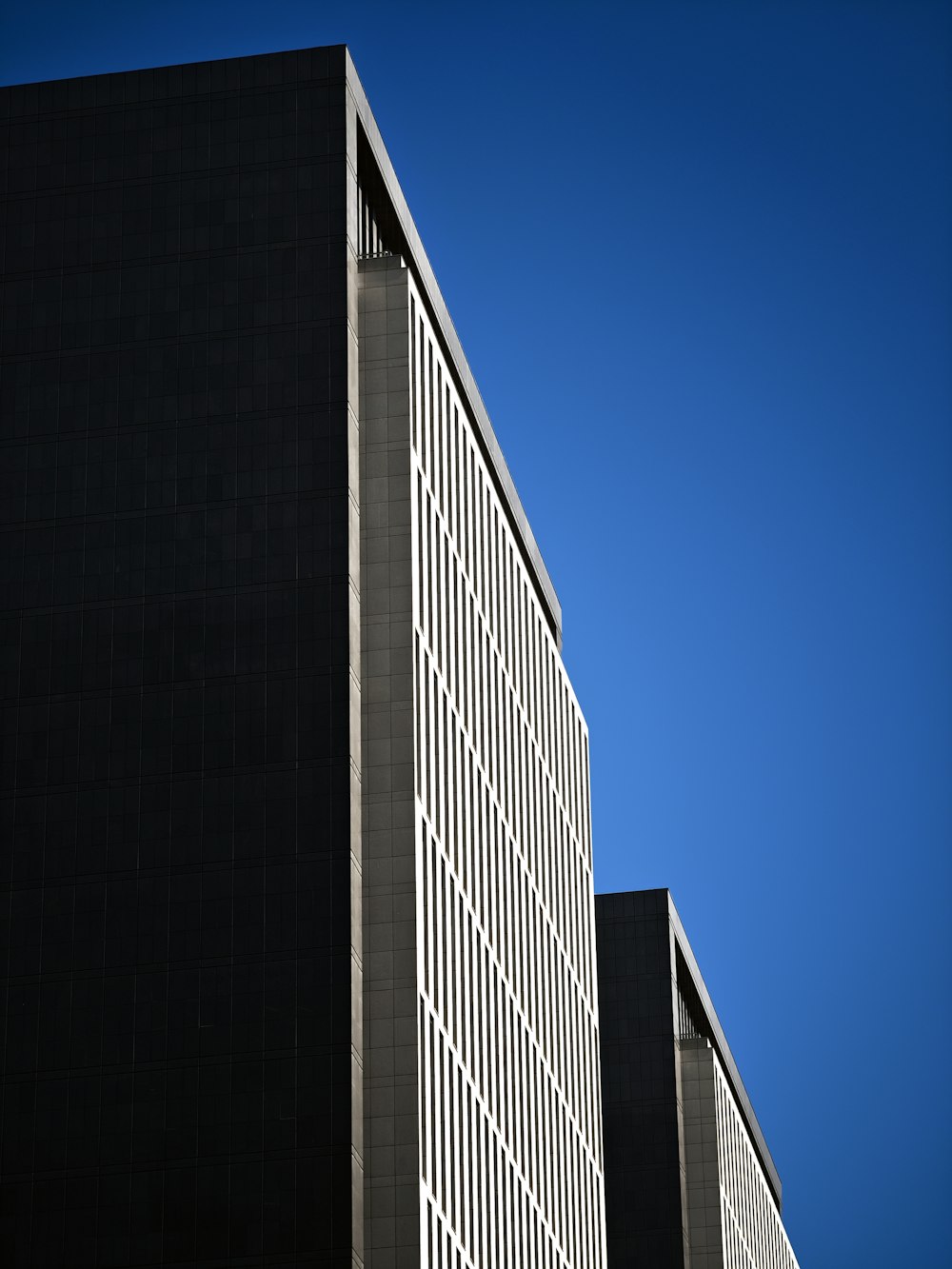 a tall building with a clock on the side of it