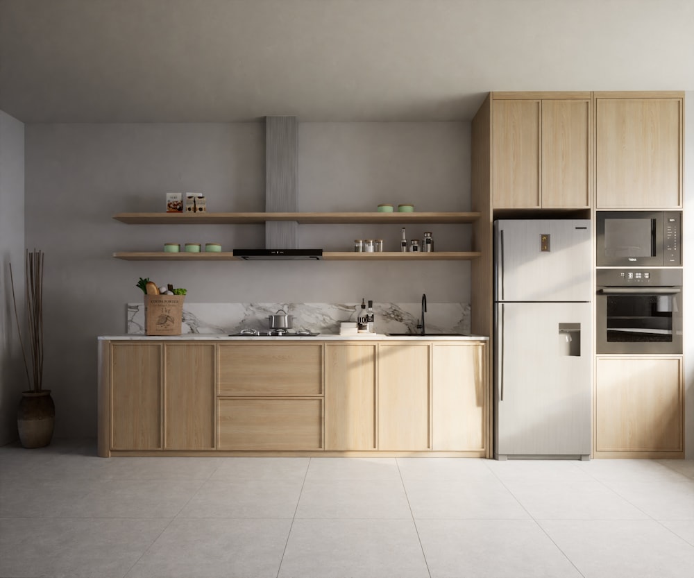 a kitchen with a refrigerator, stove, sink and shelves