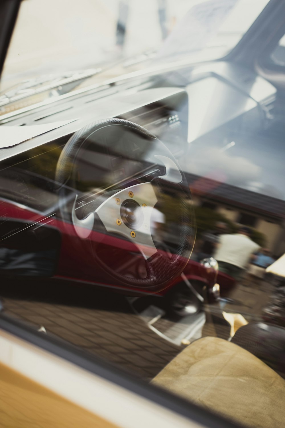 a reflection of a car in a car window