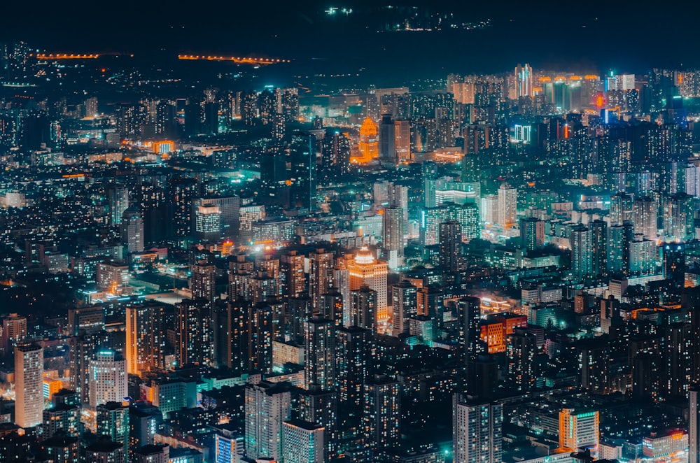 an aerial view of a city at night