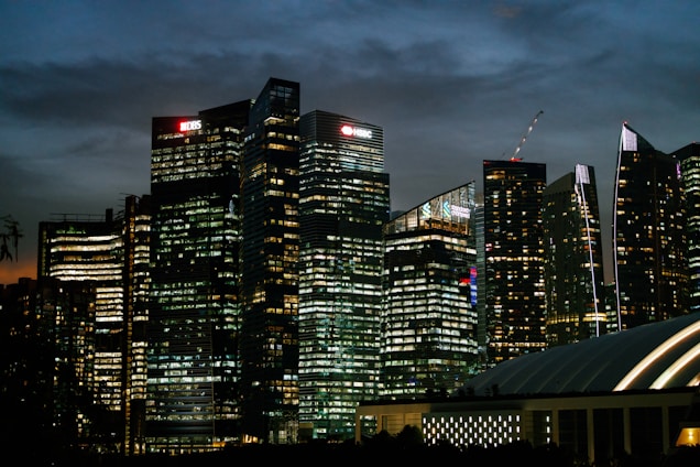 A modern European city skyline at dusk symbolizing global business connections.