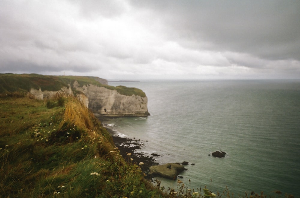 a view of the ocean from a cliff