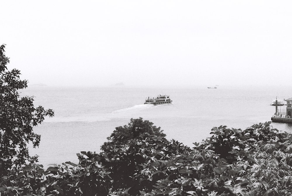 a boat traveling across a large body of water