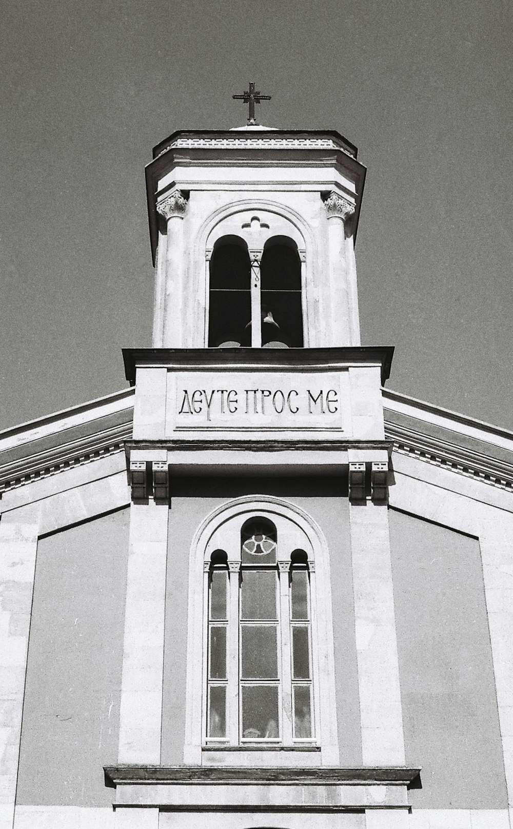 a black and white photo of a church