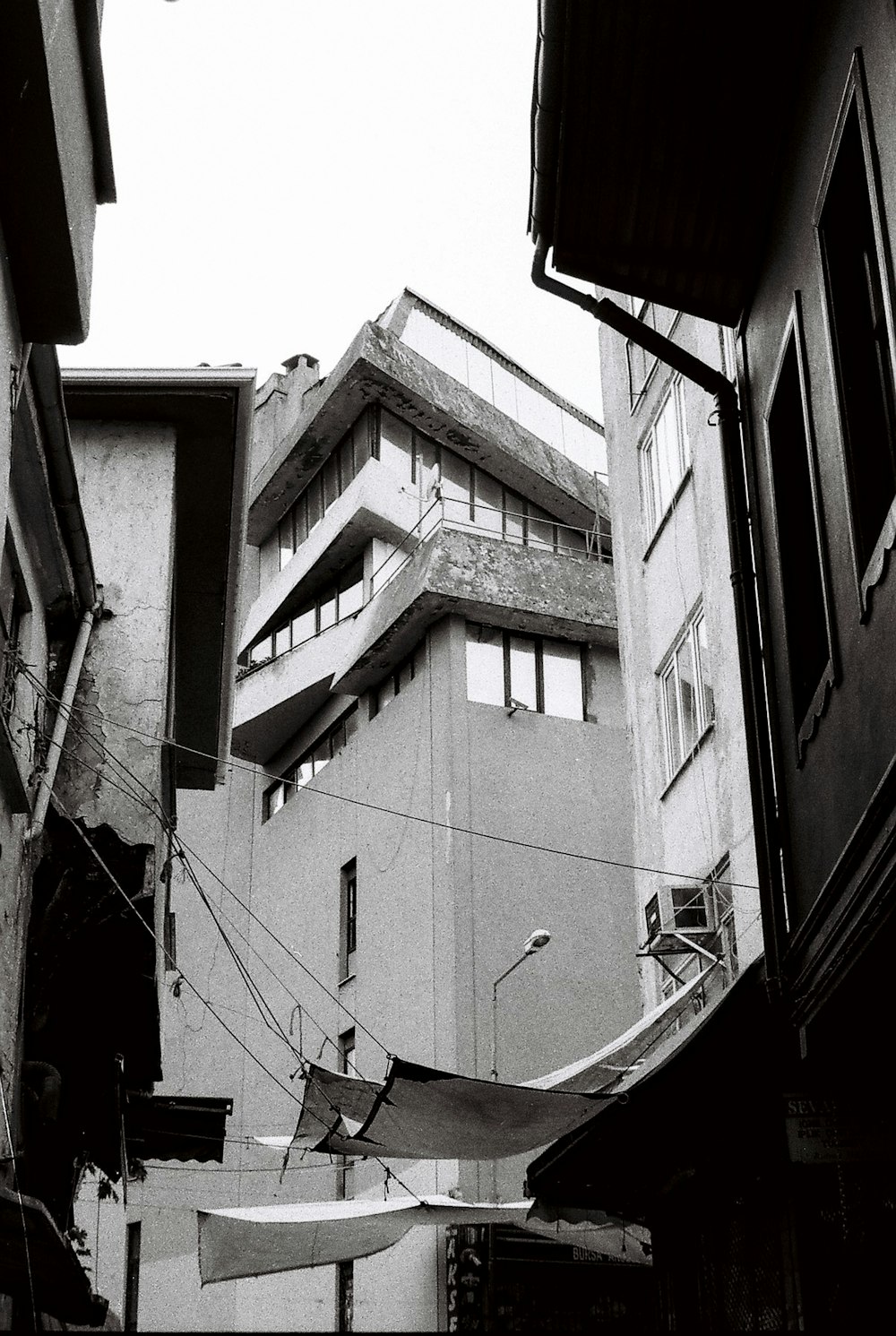 a black and white photo of a city street