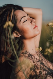 A tranquil scene of a woman enjoying a moment of relaxation.