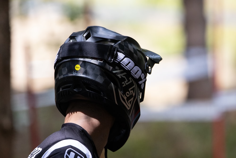 a close up of a person wearing a helmet