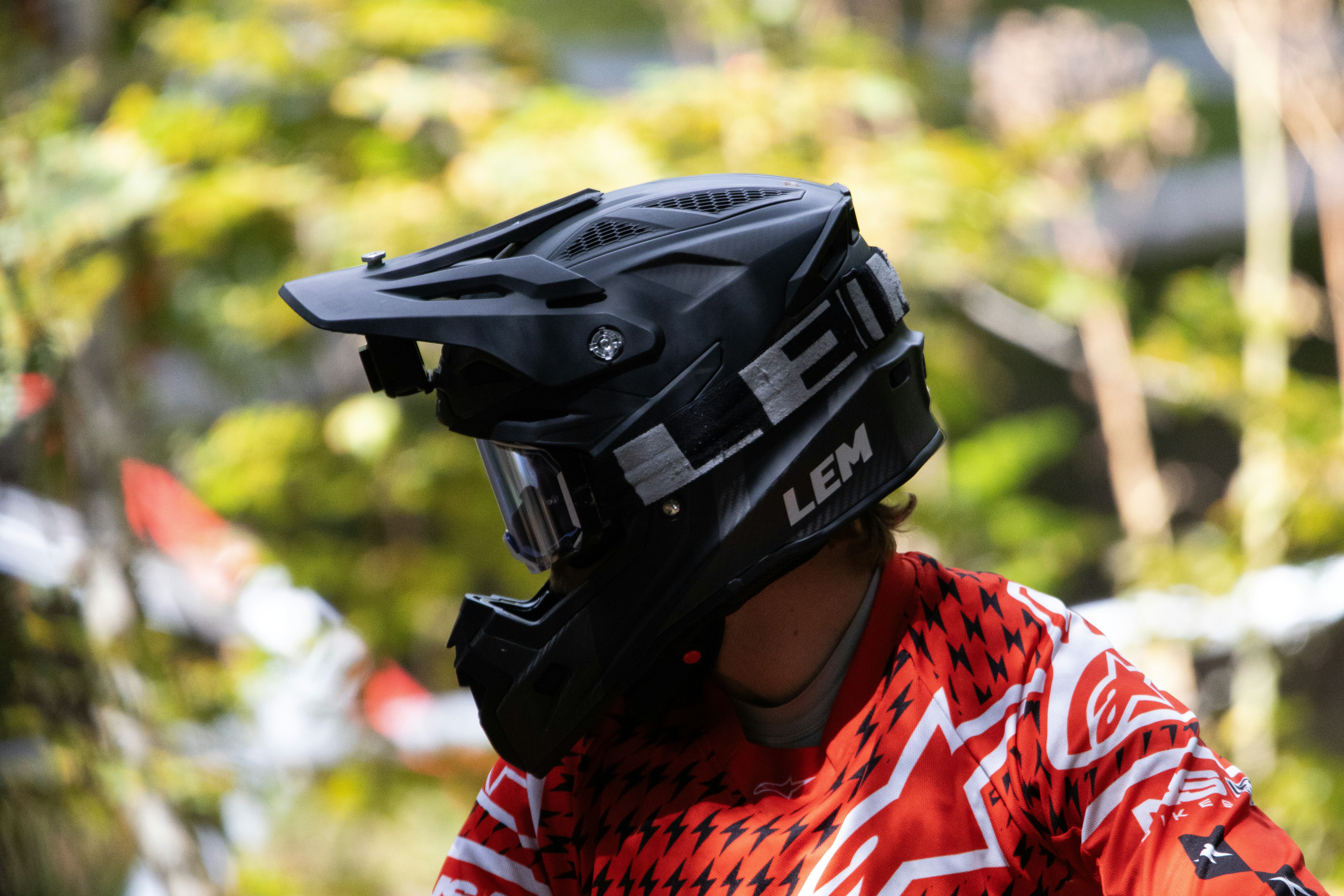 a close up of a person wearing a helmet
