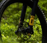 a close up of a bike on a grassy field