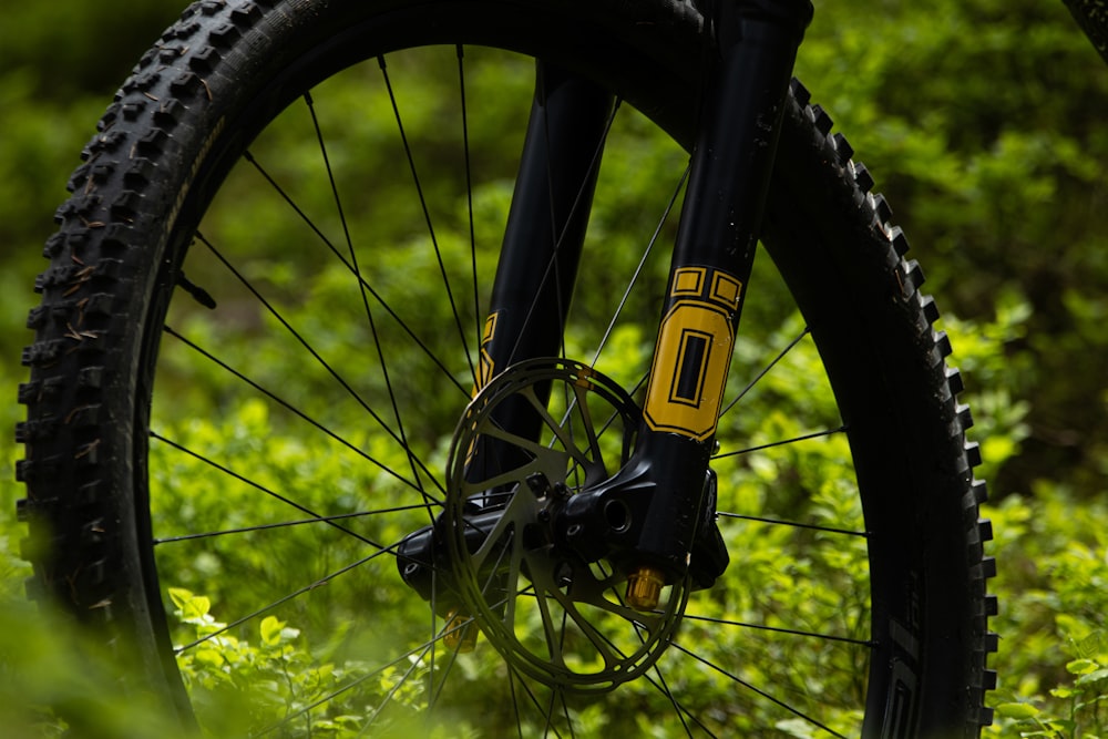 a close up of a bike on a grassy field