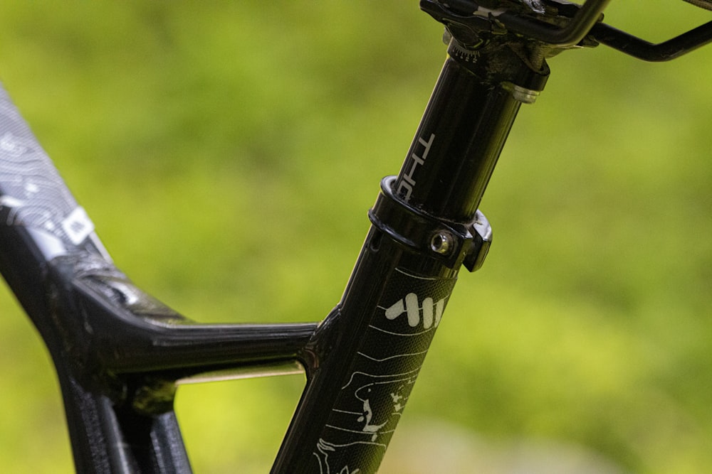 a close up of a bike frame with a blurry background