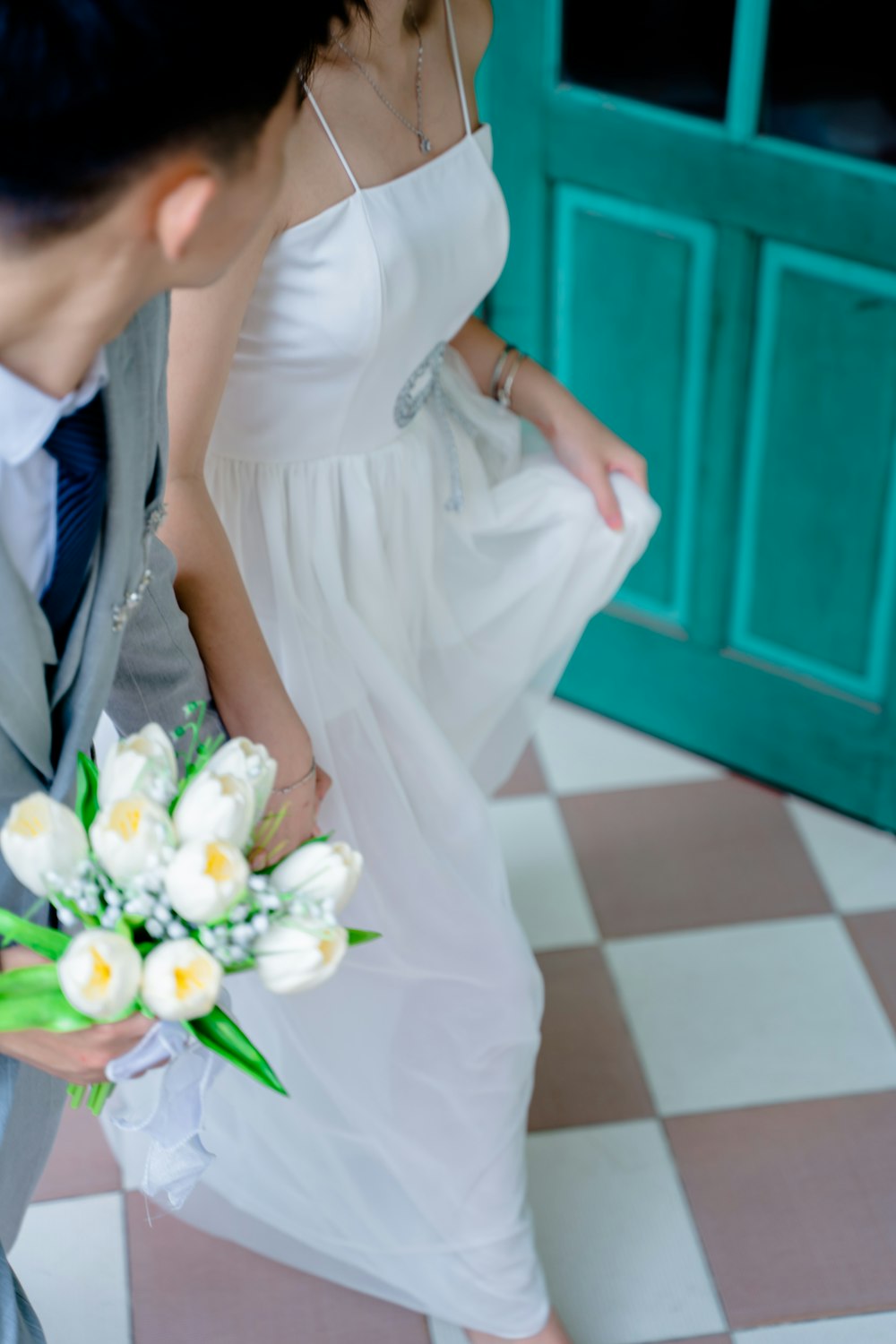 a man and a woman standing next to each other