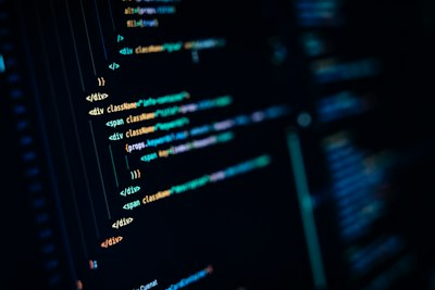 Close-up of a computer screen displaying many lines of programming code