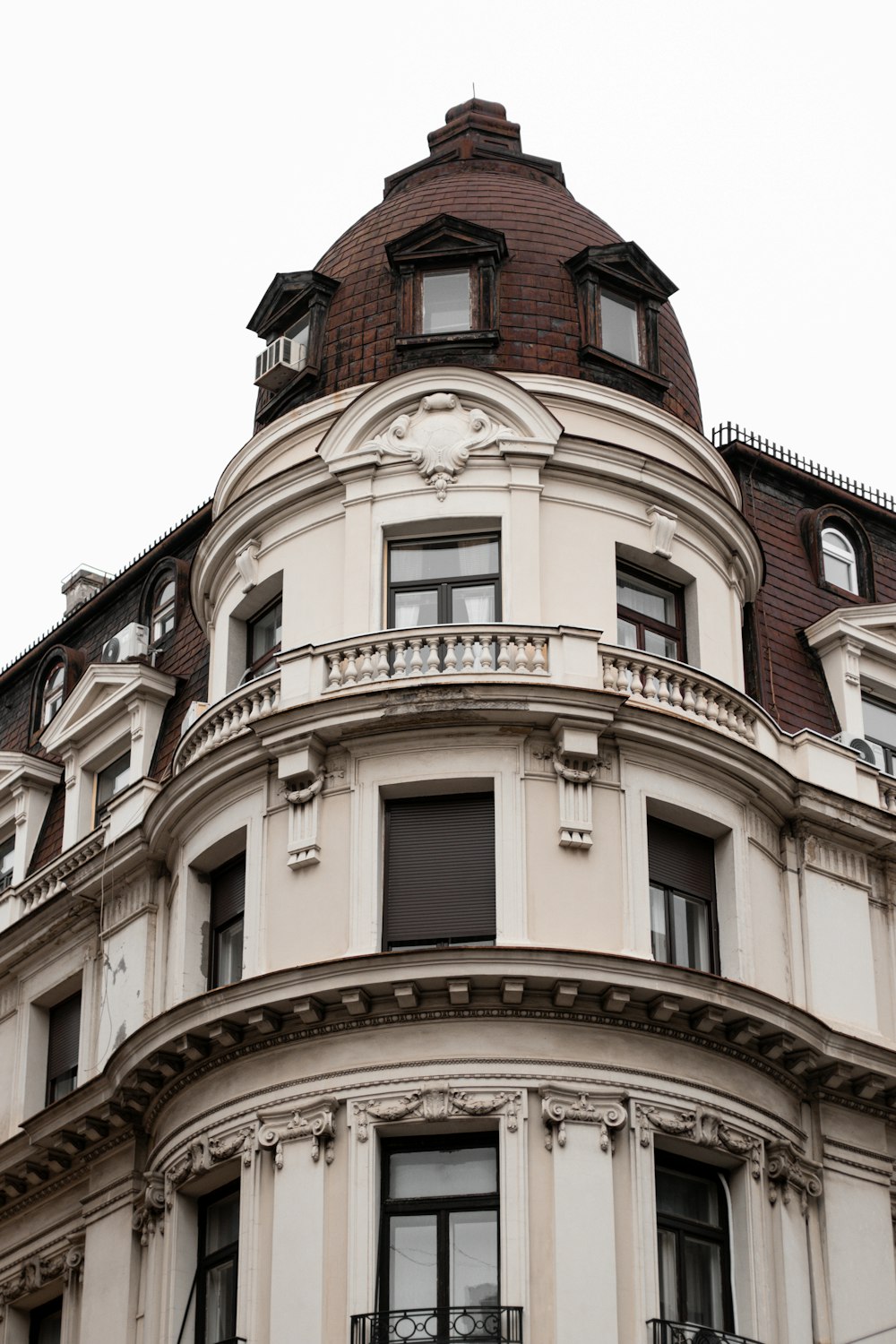 a tall building with a clock on the top of it