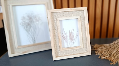 Elegant wooden picture frames crafted from reprocessed hardwood with natural finishes.