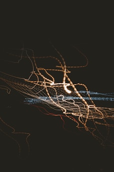 a blurry photo of a street light at night
