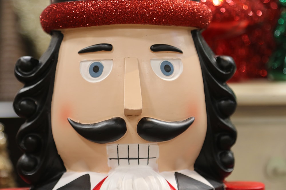 a close up of a statue of a nutcracker