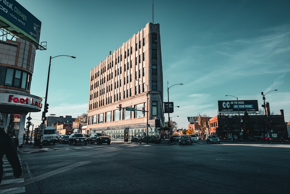 a tall building sitting on the side of a road