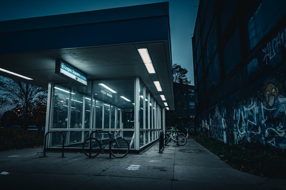 a bike is parked in front of a building