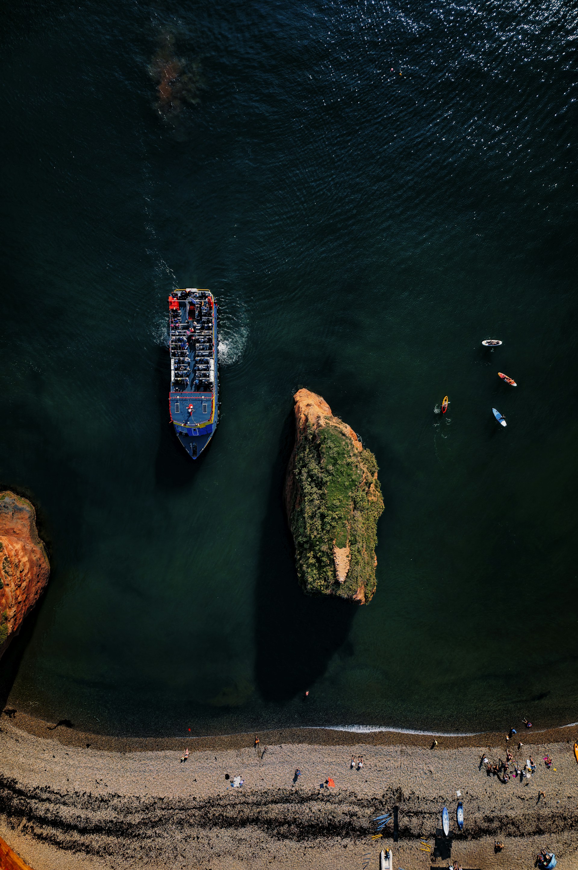 a large boat floating on top of a body of water