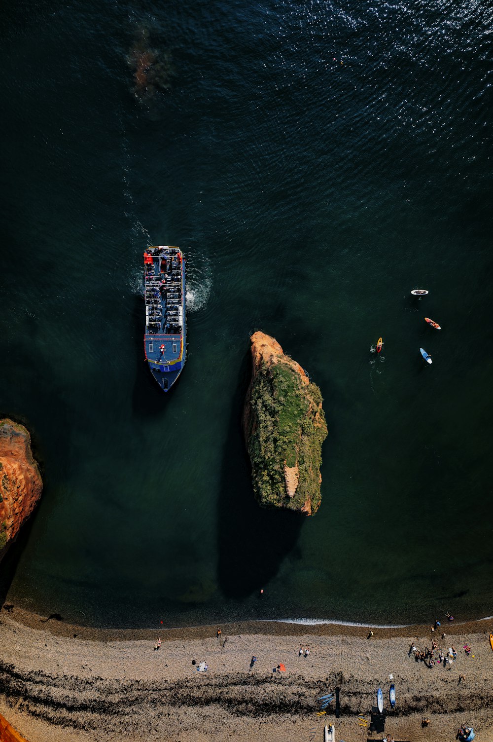 a large boat floating on top of a body of water