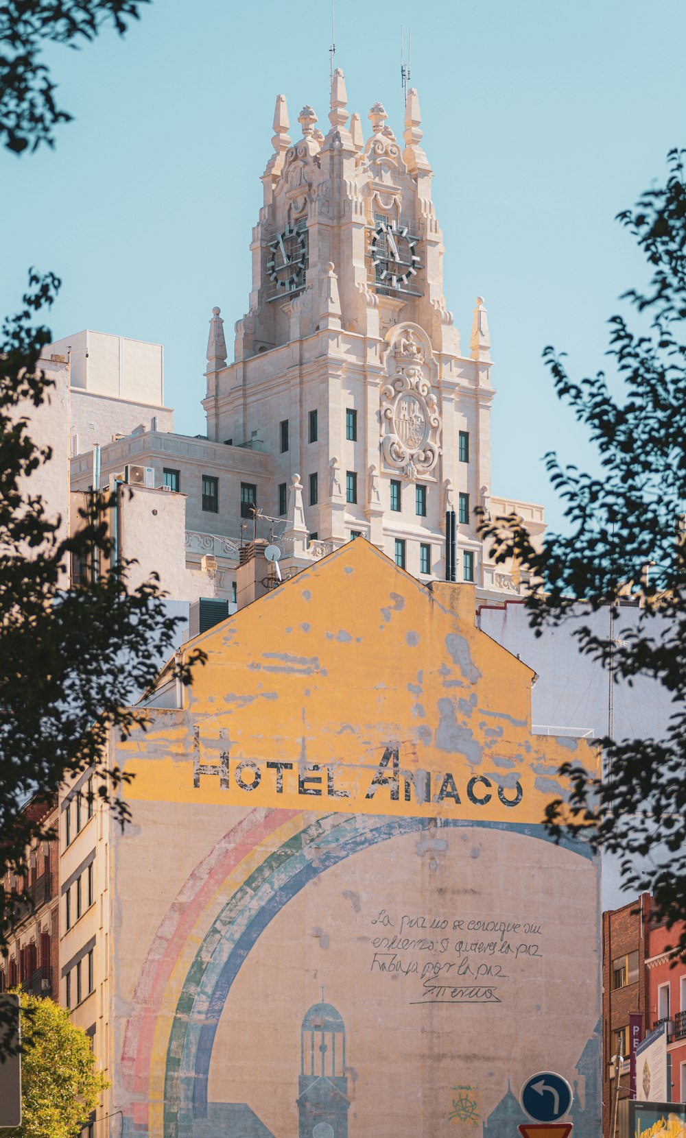 a tall building with a clock on it's side