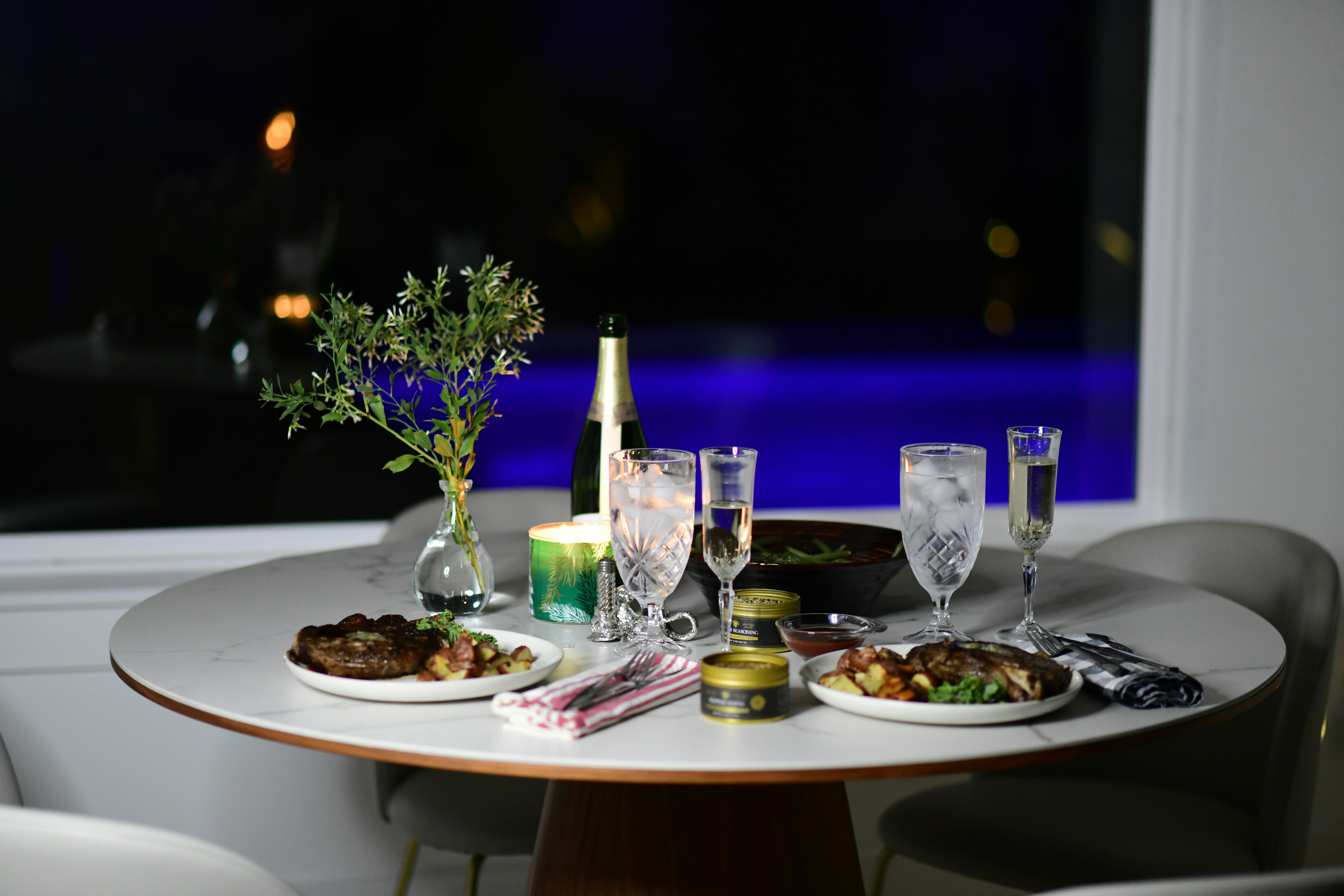 beautifully plated international cuisine on a rooftop table - rooftop restaurants san diego gaslamp