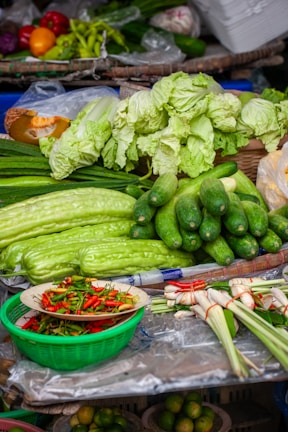 a table filled with lots of different types of vegetables