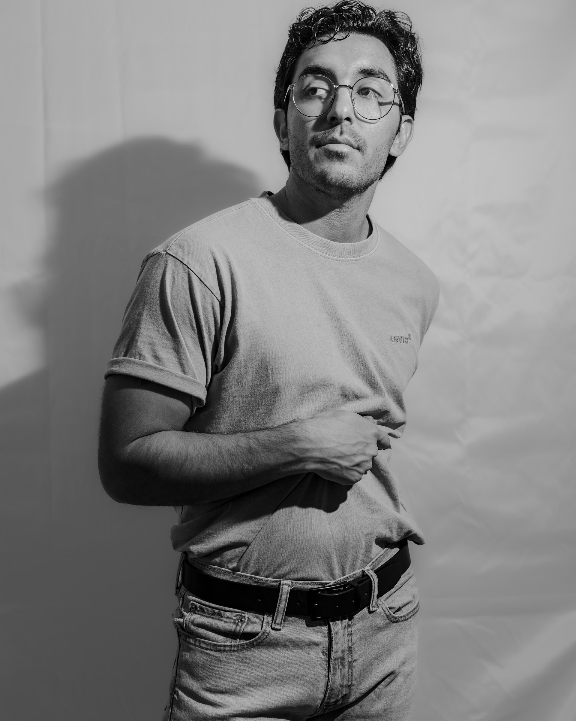 person wearing grey knit sweater