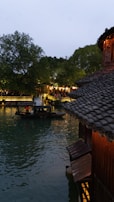 A traditional Vietnamese boat gliding through a tranquil river.