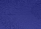 Blue and black abstract technology background with digital elements.