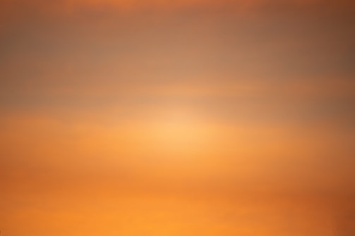 A peaceful digital sanctuary interface with warm amber and stone tones