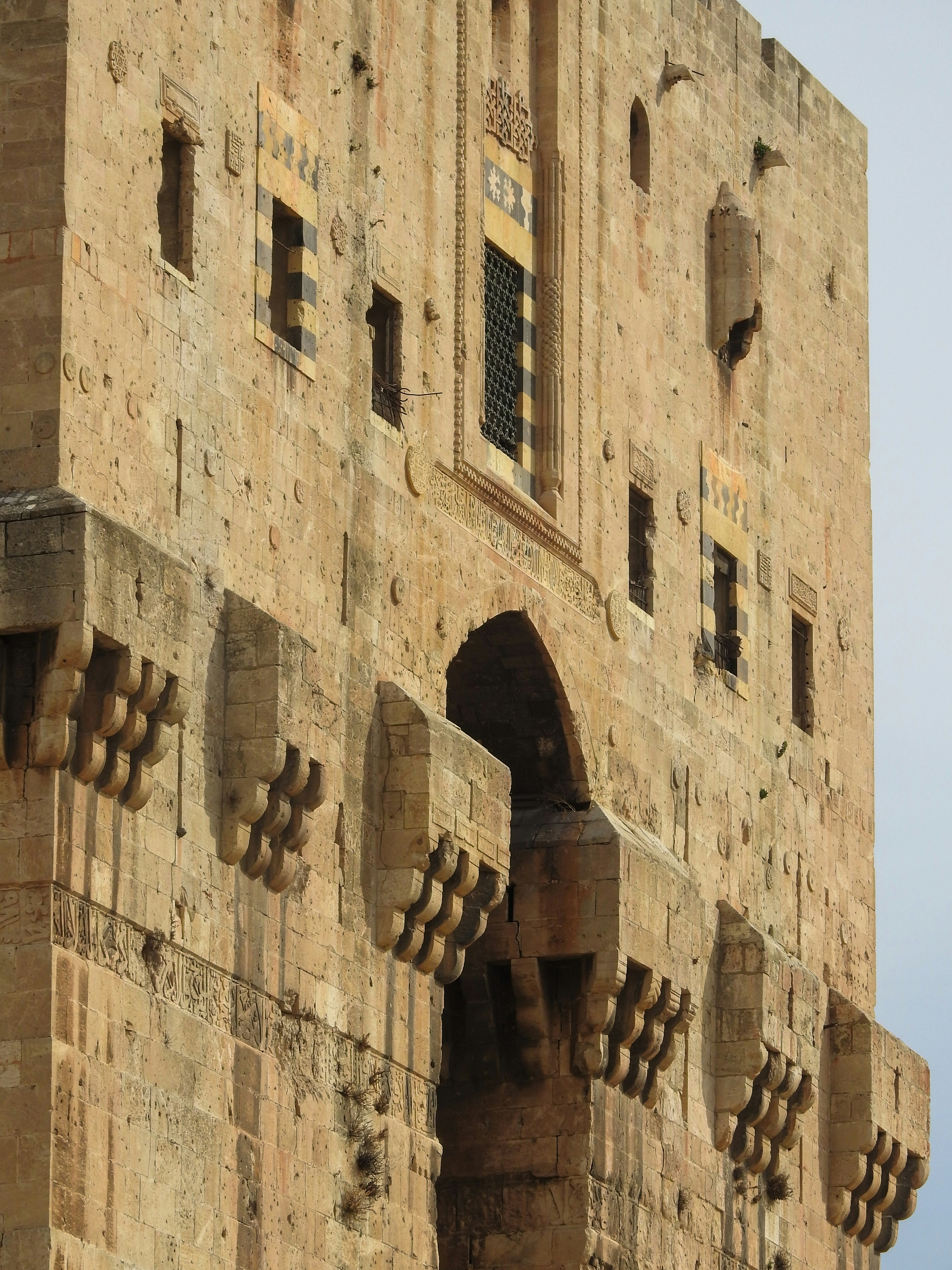 a very tall building with a clock on it's side