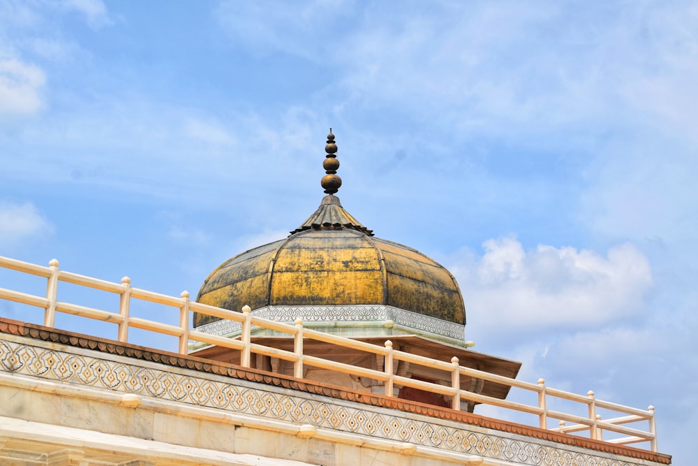 a yellow dome on top of a building
