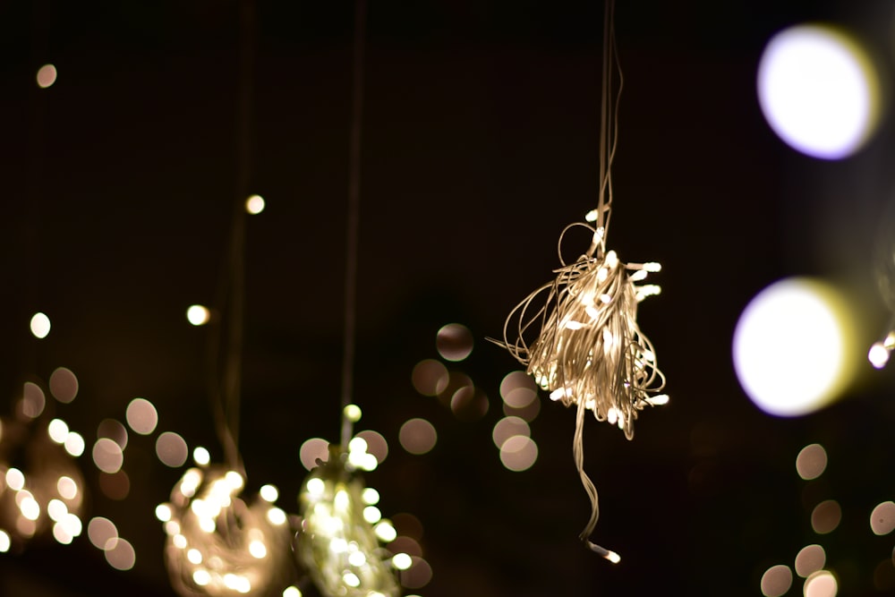 a string of lights hanging from a ceiling