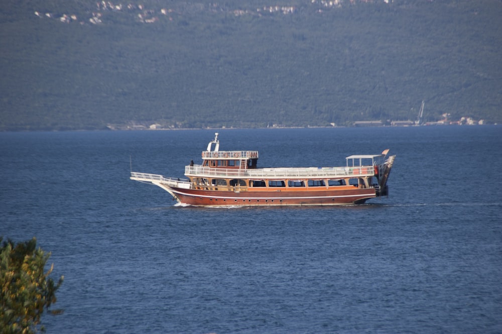 a boat floating on top of a large body of water