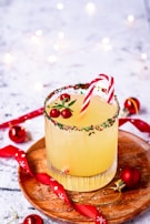 Festive Christmas drinks in elegant glasses with garnishes.