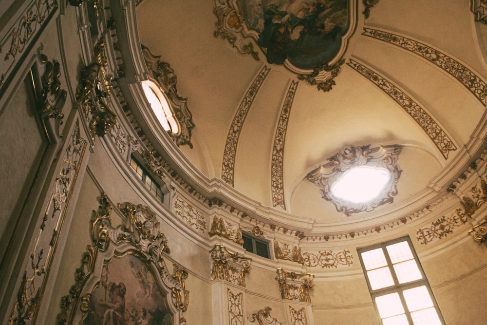 the ceiling of a building with a light in it