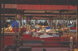 A bustling farmers market with fresh produce stalls and locals chatting.