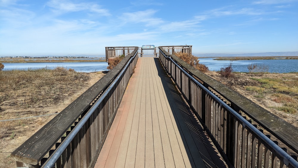 a wooden bridge over a body of water