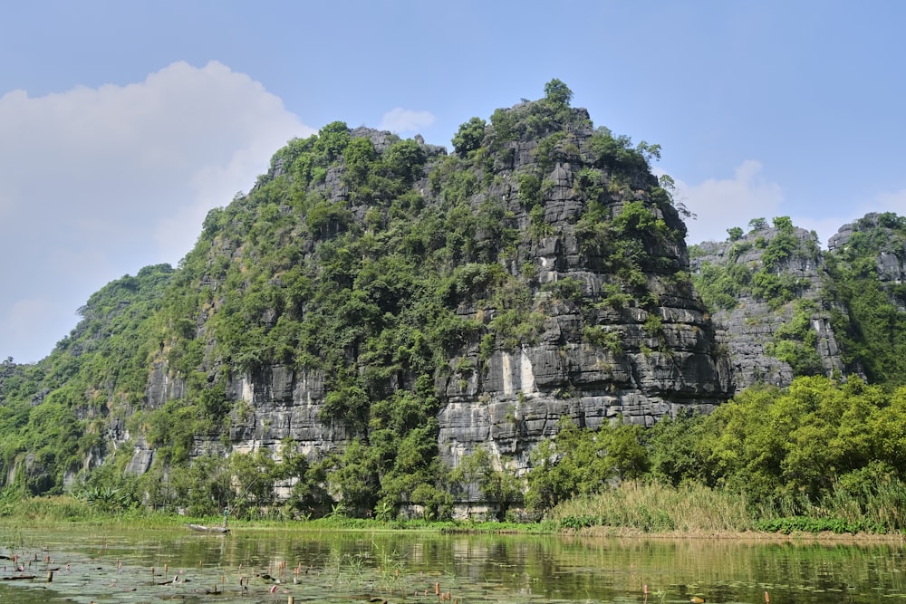 a mountain with a lake in front of it