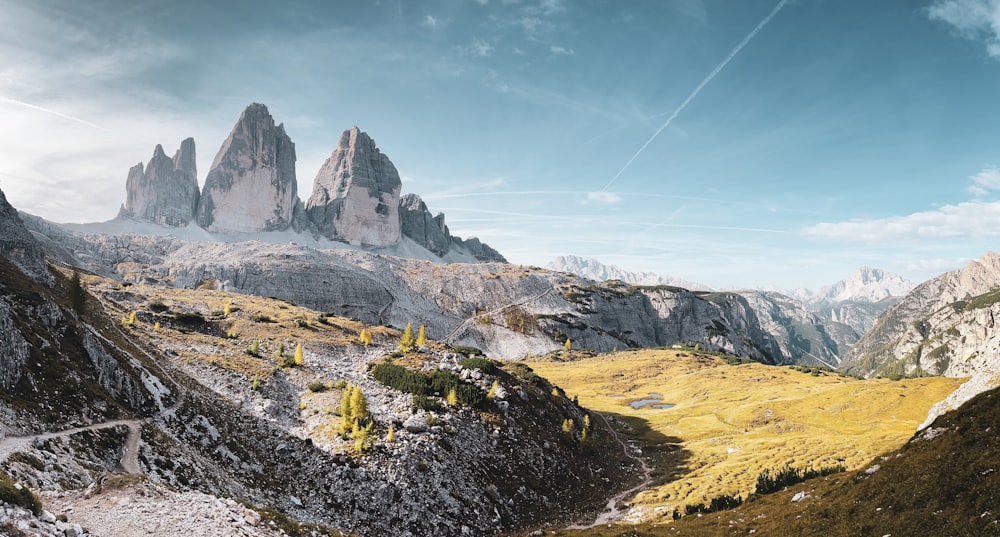 a view of a mountain range from a trail