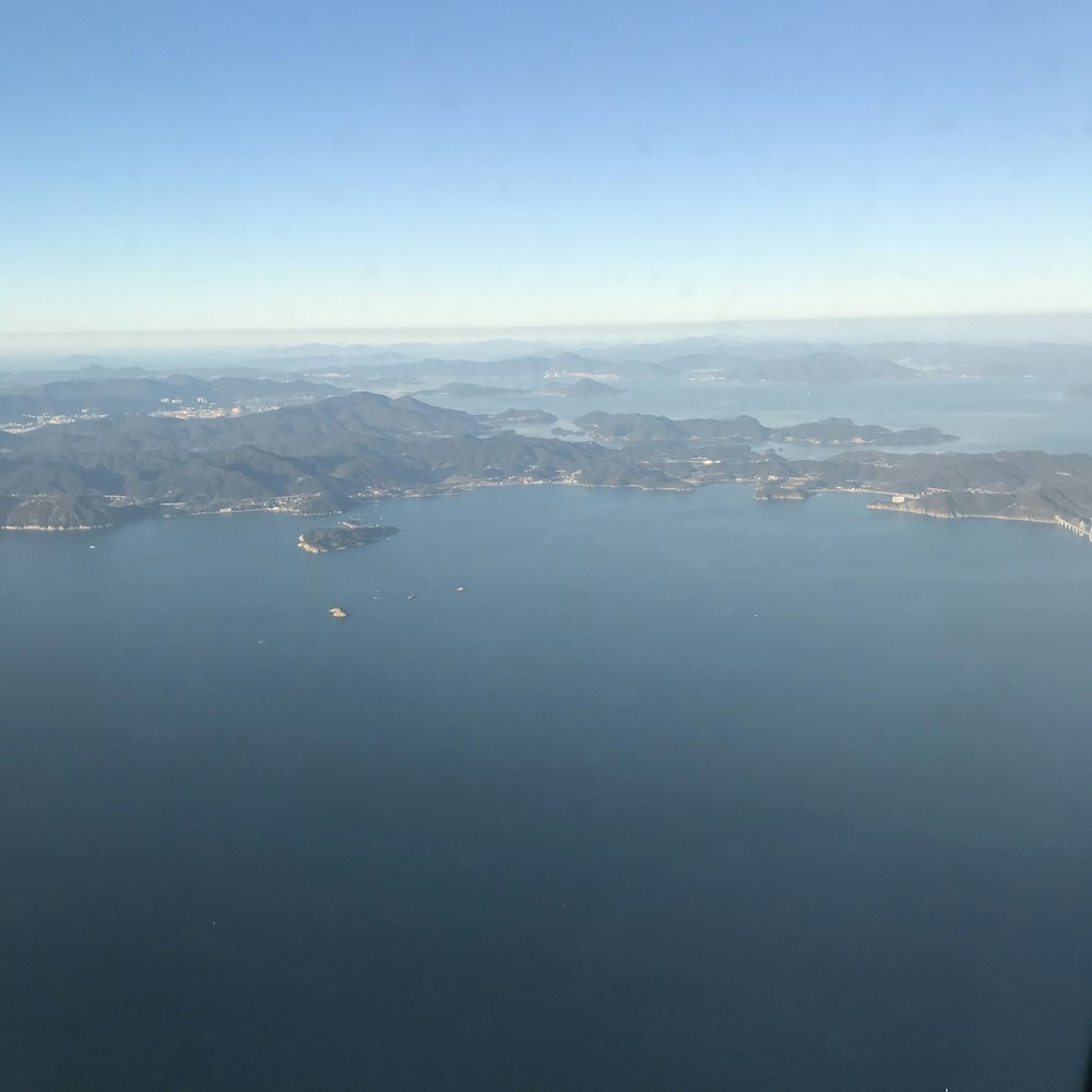 a large body of water surrounded by mountains