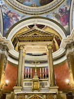 The church altar adorned with centuries-old carvings and delicate religious symbols.