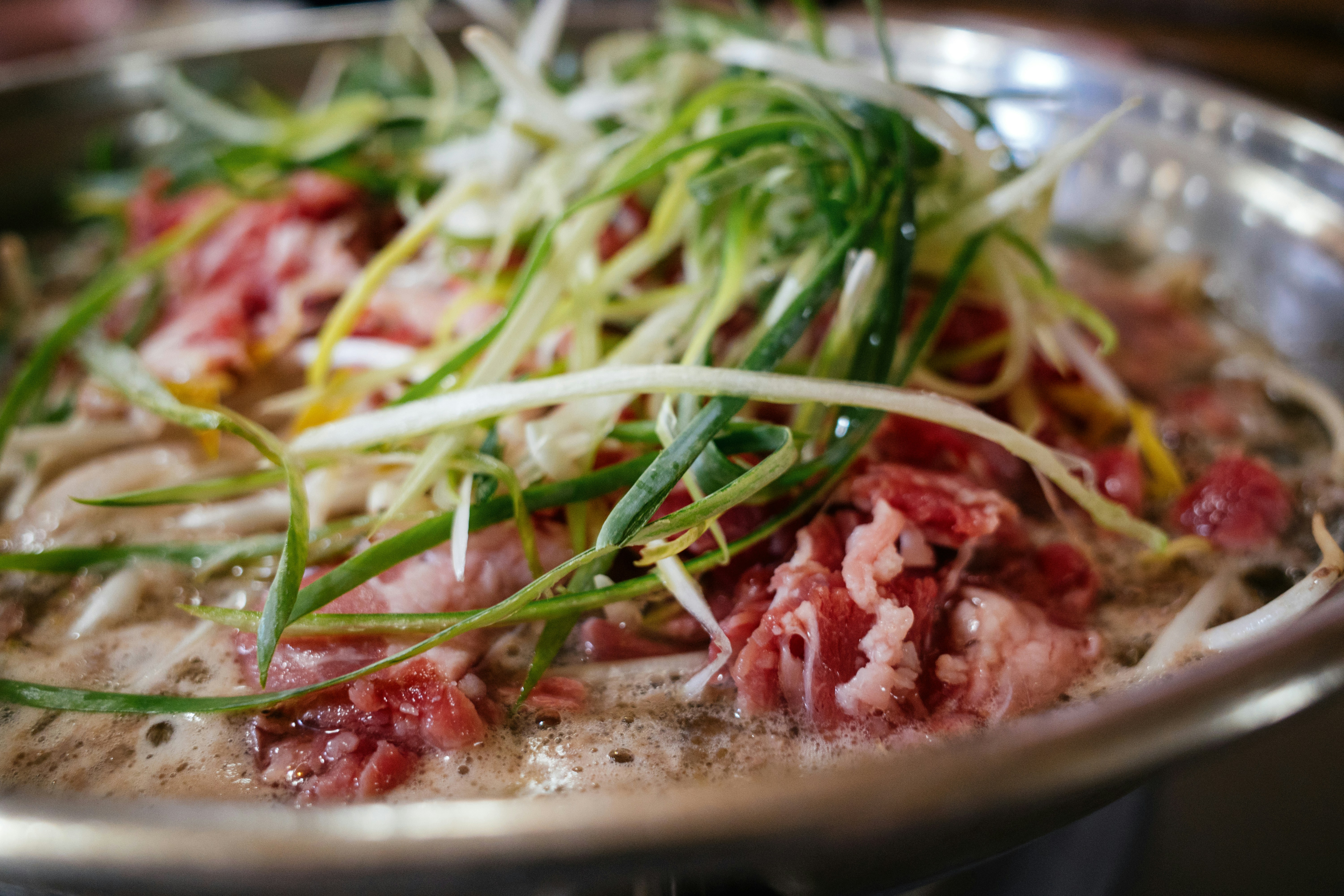 a close up of food in a pan on a table