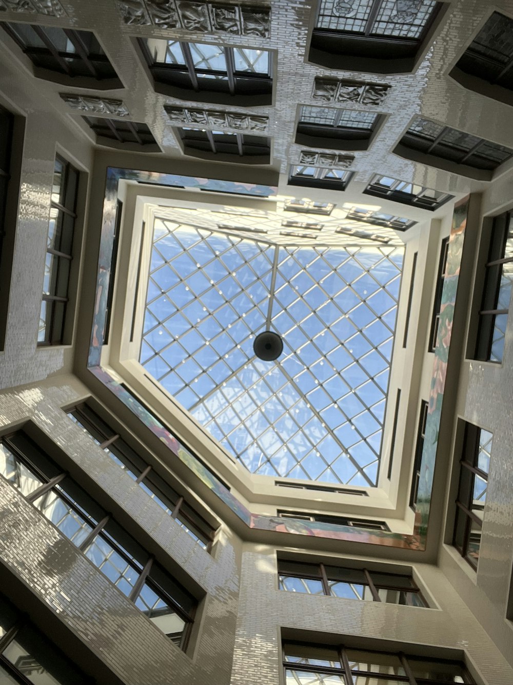 looking up at the ceiling of a building