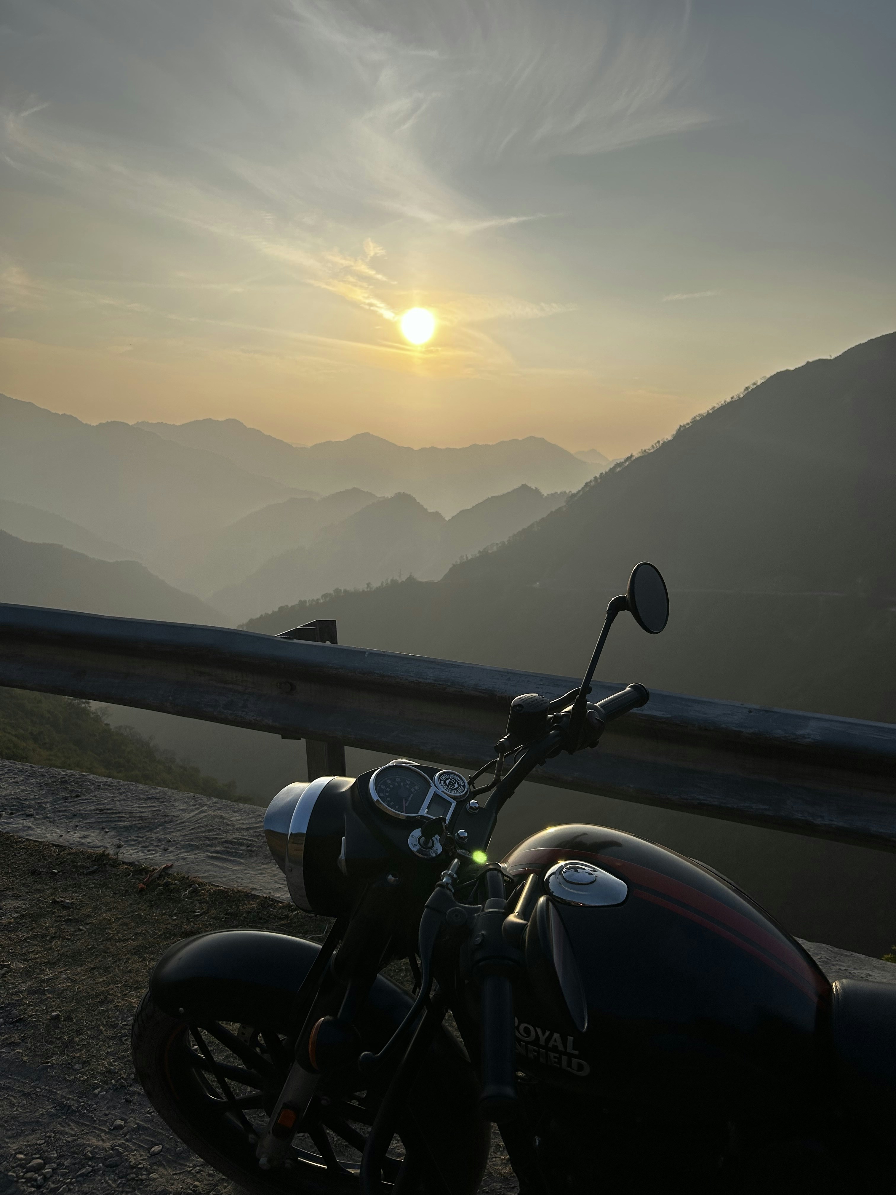 a motorcycle parked on the side of a road