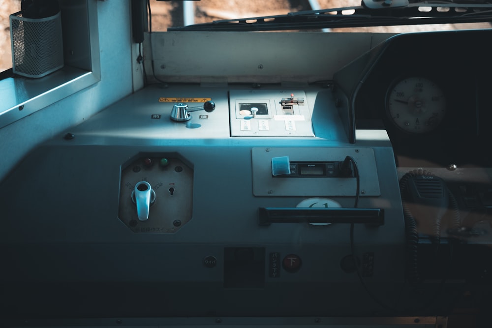 a close up of a machine with a clock on it